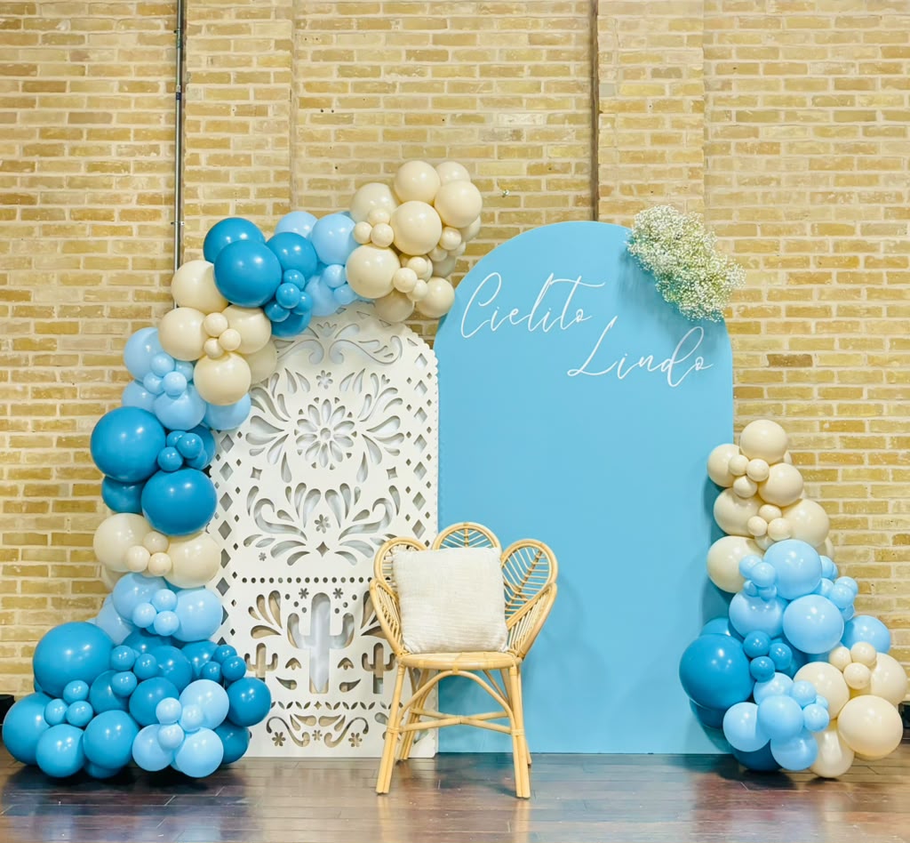 Cielito Lindo blue and ivory balloon arch with talavera detail by LUX Event Design